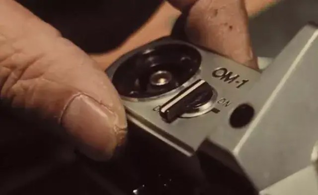 OM-1 side